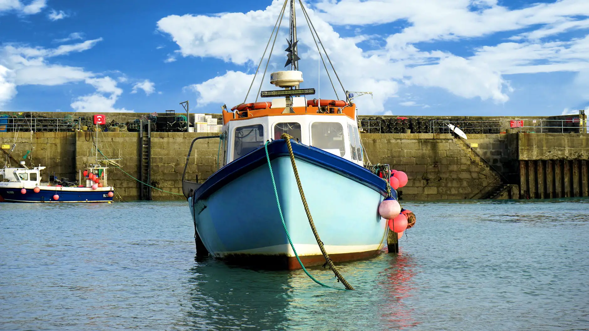 blue boats dock fishing boat