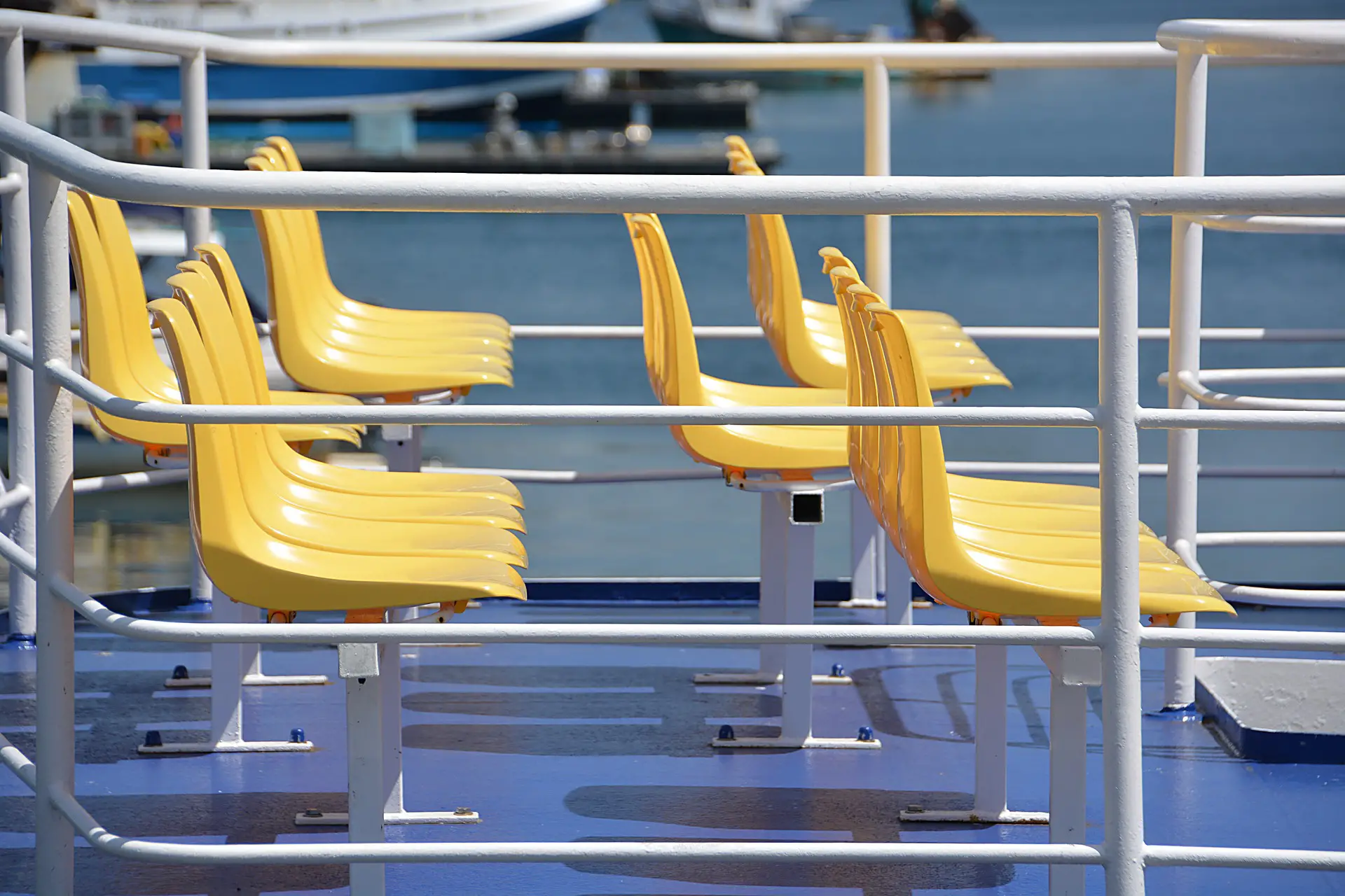 Yellow seats mounted on a transport vessel