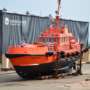 A rescue boat at a shipyard hauled out of the water