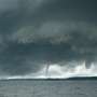 A waterspout off in the distance