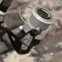 A spinning fishing reel spooled with line