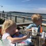 Kids enjoying a meal on the water at Hudson's on Hilton Head