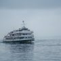 A Ferry boat operating in the fog